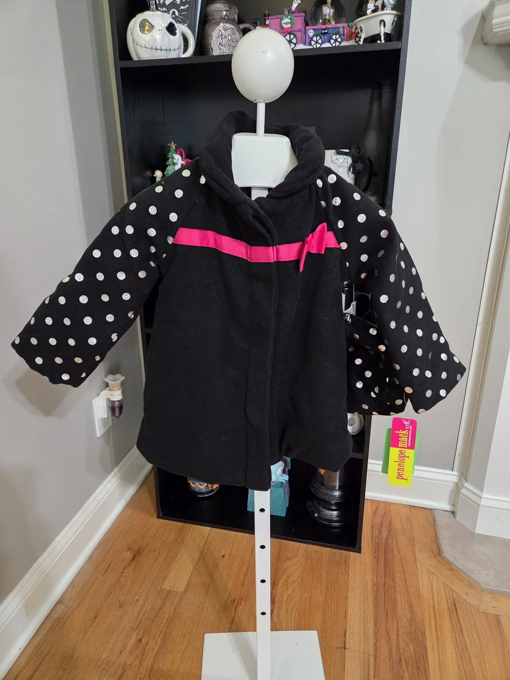 Penelope Mack Black Coat with White Polka-Dot Sleeves And Matching Hat